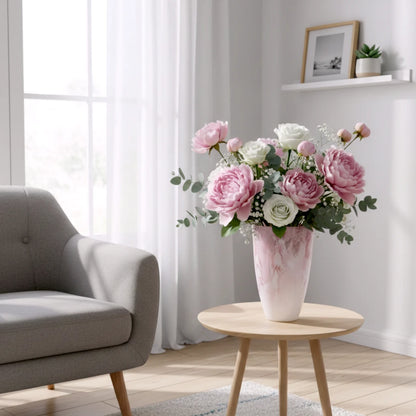 Frosted white glass vase with soft blush marble veining and smooth tapered silhouette.