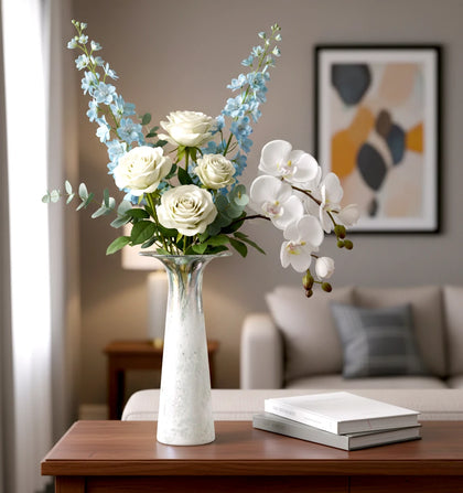 Tall frosted white glass vase with elongated tapered body and flared iridescent rim.