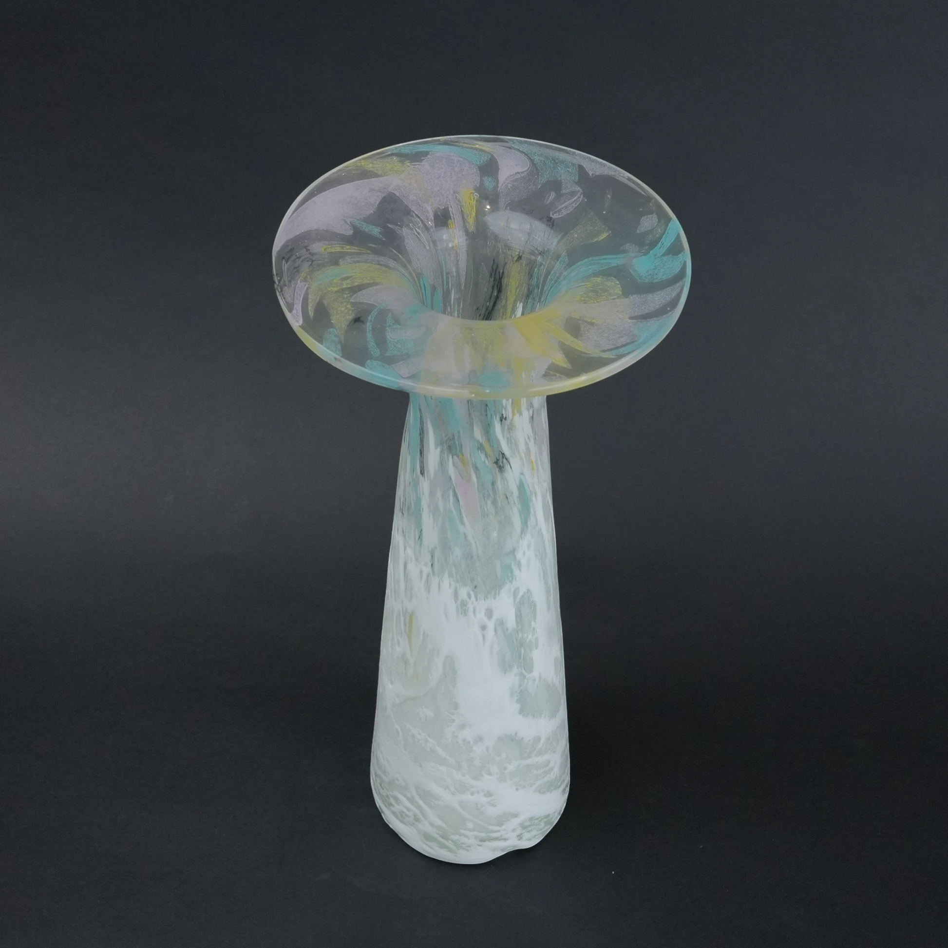 Tall frosted white glass vase with elongated tapered body and flared iridescent rim.