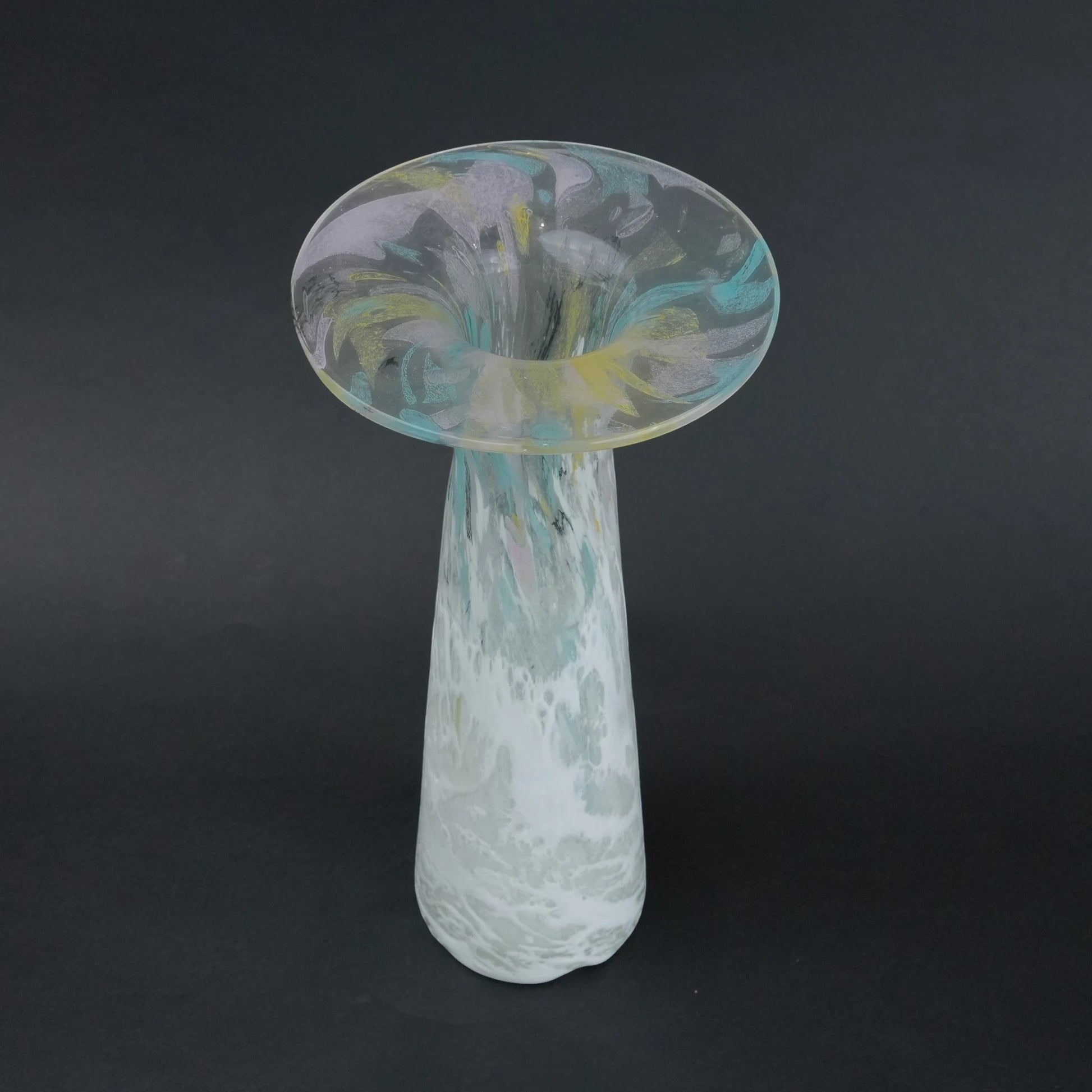Tall frosted white glass vase with elongated tapered body and flared iridescent rim.
