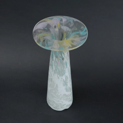 Tall frosted white glass vase with elongated tapered body and flared iridescent rim.