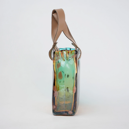 Dual-tone teal and amber glass handbag-shaped vase with bubble-textured surface and arched handle