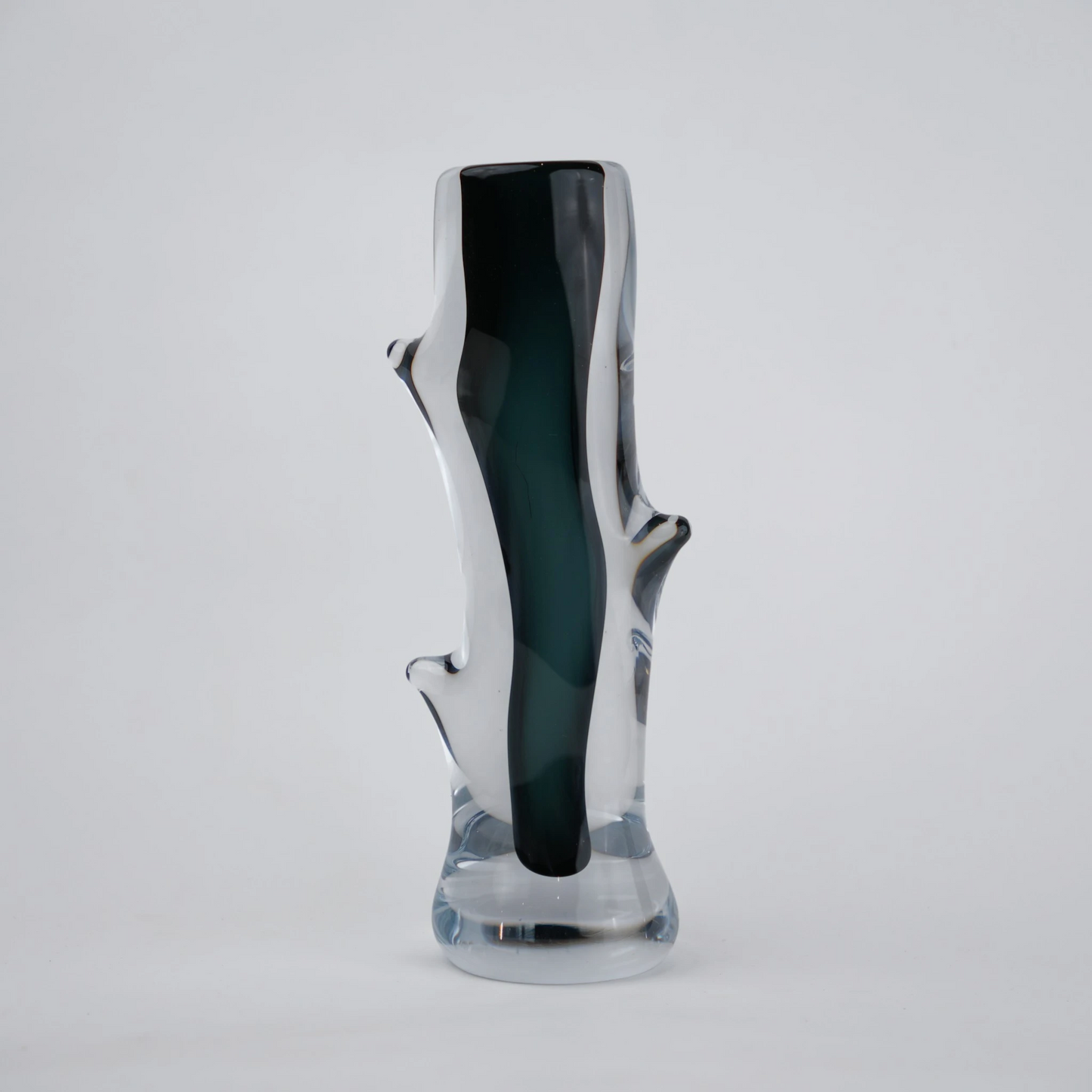 Clear glass stem vase with a branch-like shape and an inner core detail.