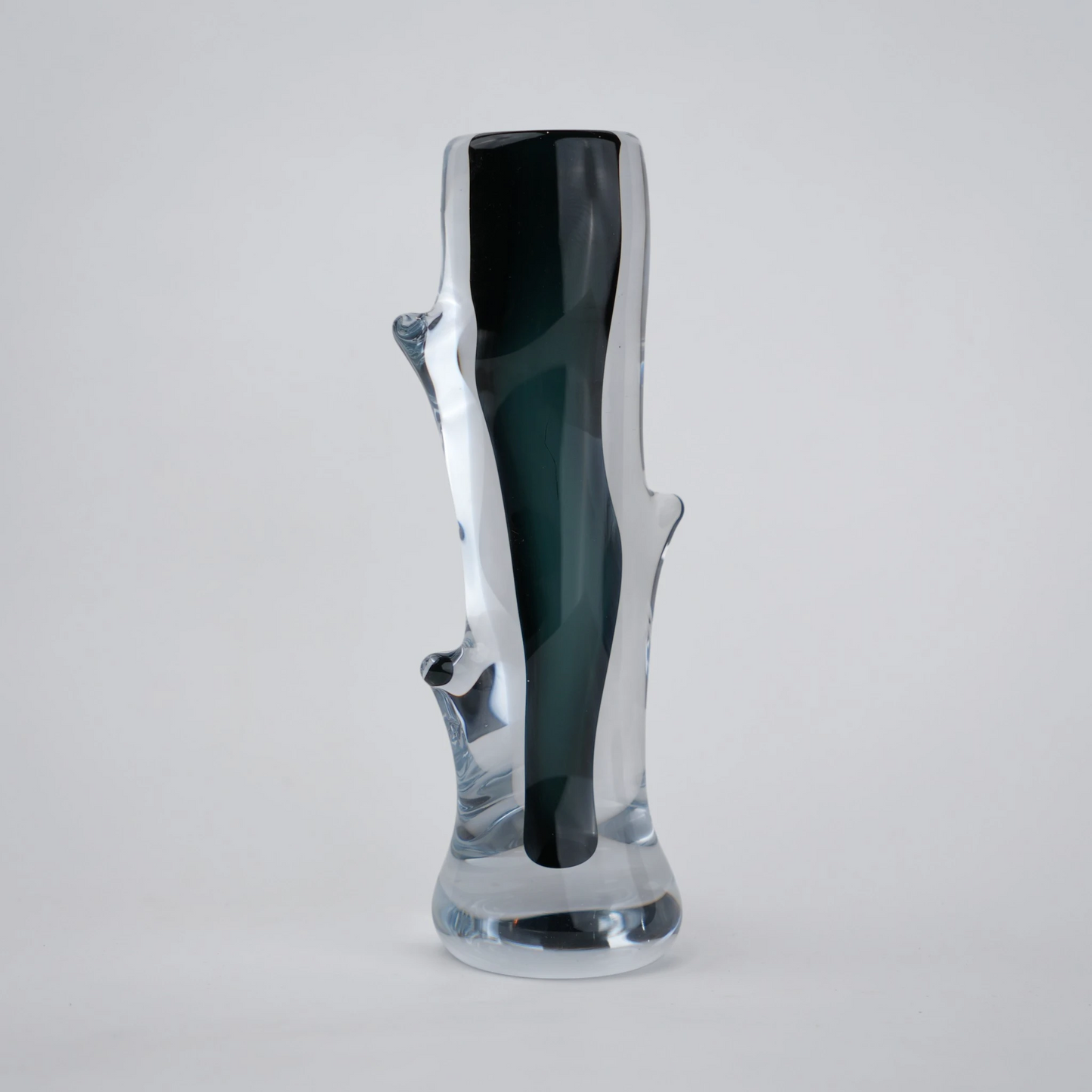 Clear glass stem vase with a branch-like shape and an inner core detail.