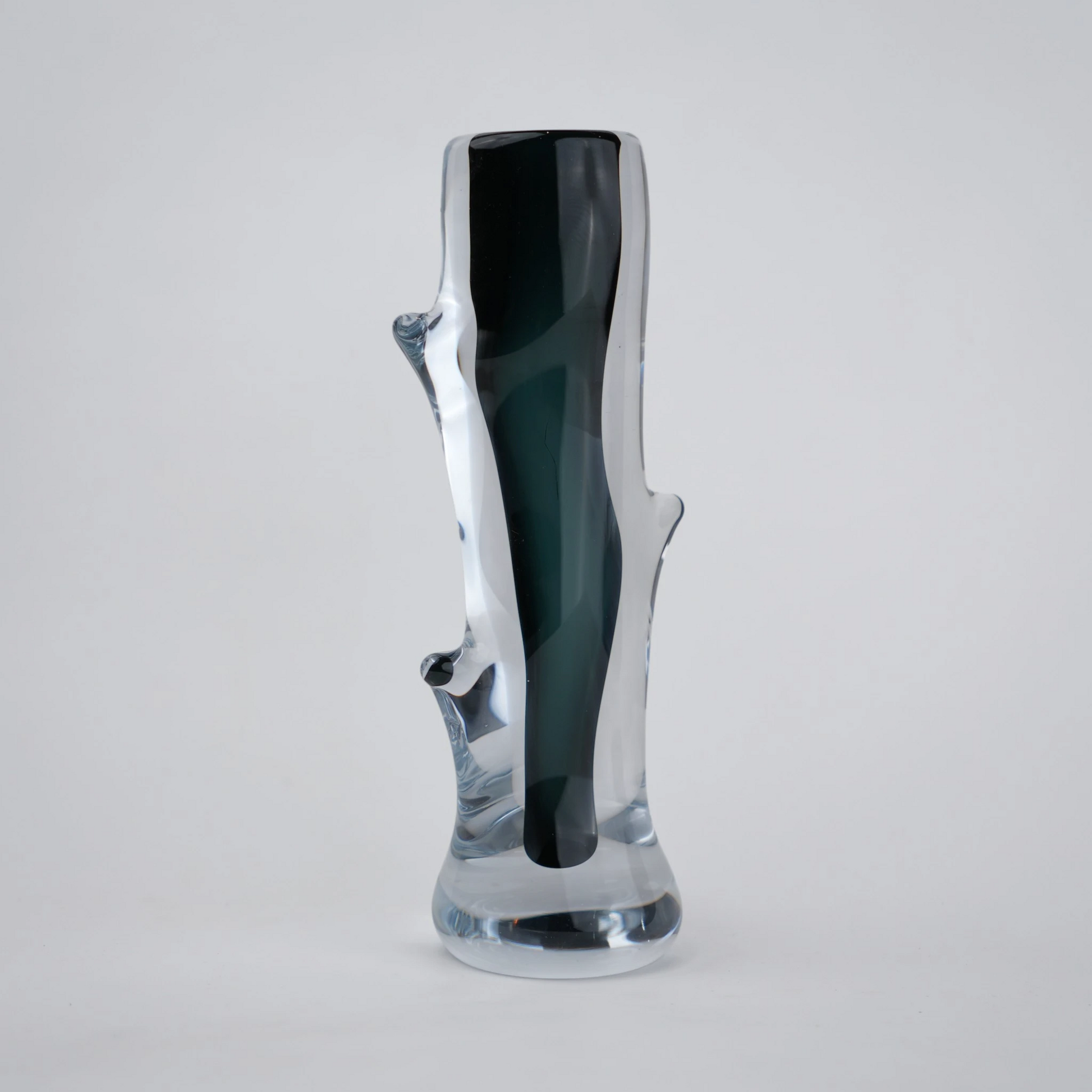 Clear glass stem vase with a branch-like shape and an inner core detail.