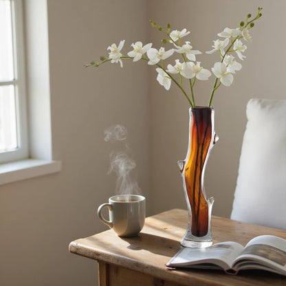 Clear glass stem vase with a branch-like shape and an inner core detail.
