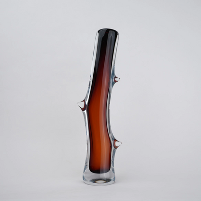 Clear glass stem vase with a branch-like shape and an inner core detail.