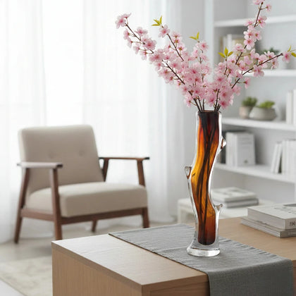 Clear glass stem vase with a branch-like shape and an inner core detail.