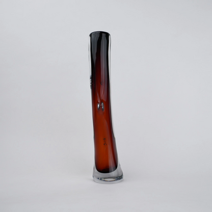 Clear glass stem vase with a branch-like shape and an inner core detail.