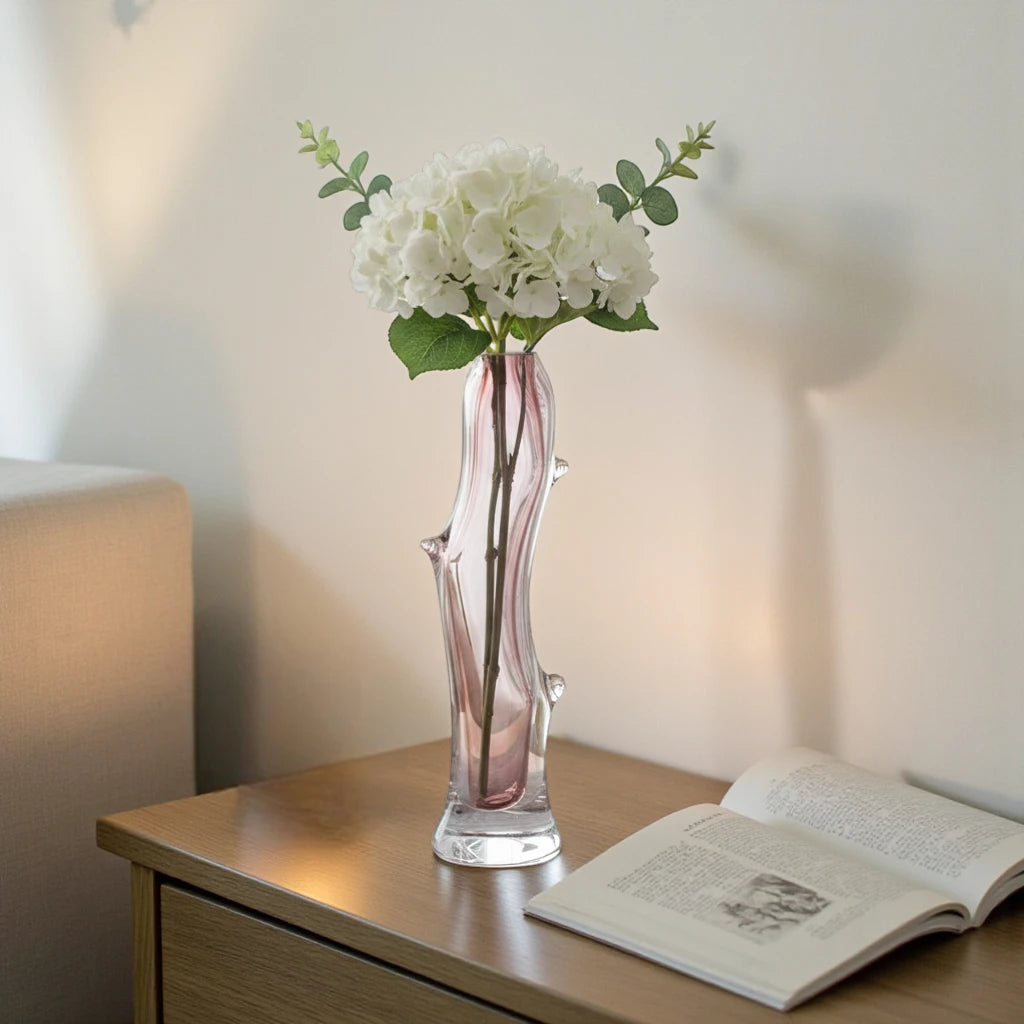 Clear glass stem vase with a branch-like shape and an inner core detail.