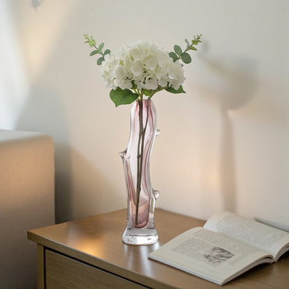 Clear glass stem vase with a branch-like shape and an inner core detail.