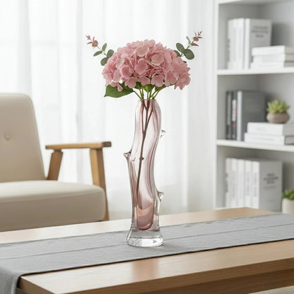Clear glass stem vase with a branch-like shape and an inner core detail.