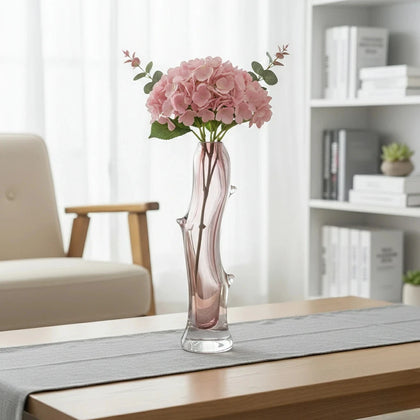 Clear glass stem vase with a branch-like shape and an inner core detail.