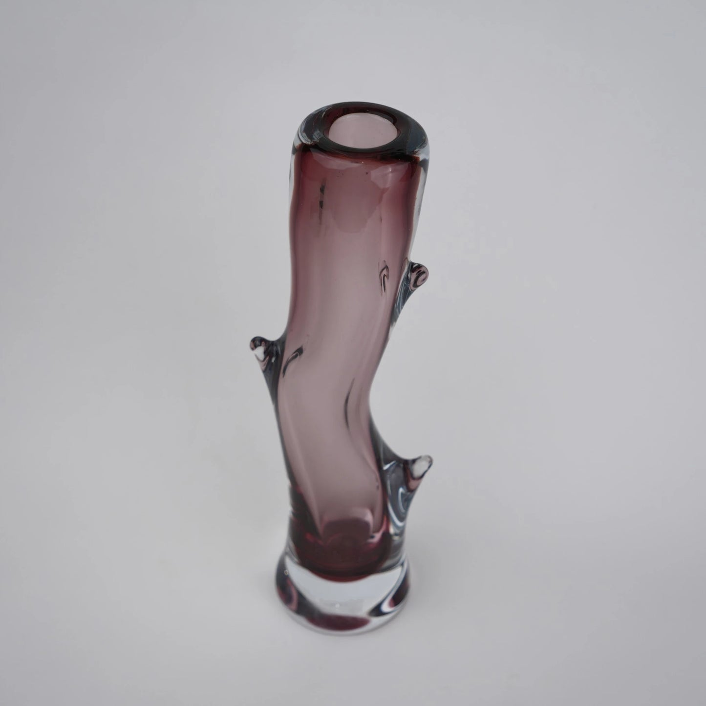 Burgundy stem vase 3/4 wavy form view