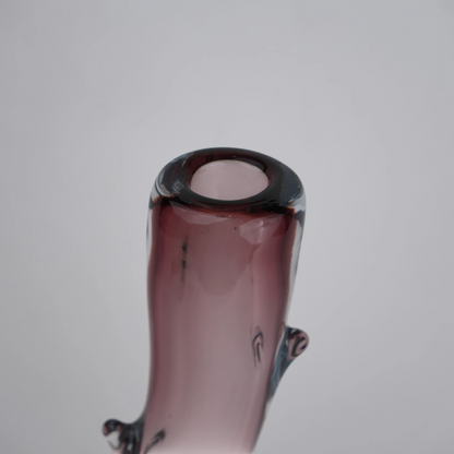Burgundy stem vase macro of curved rim