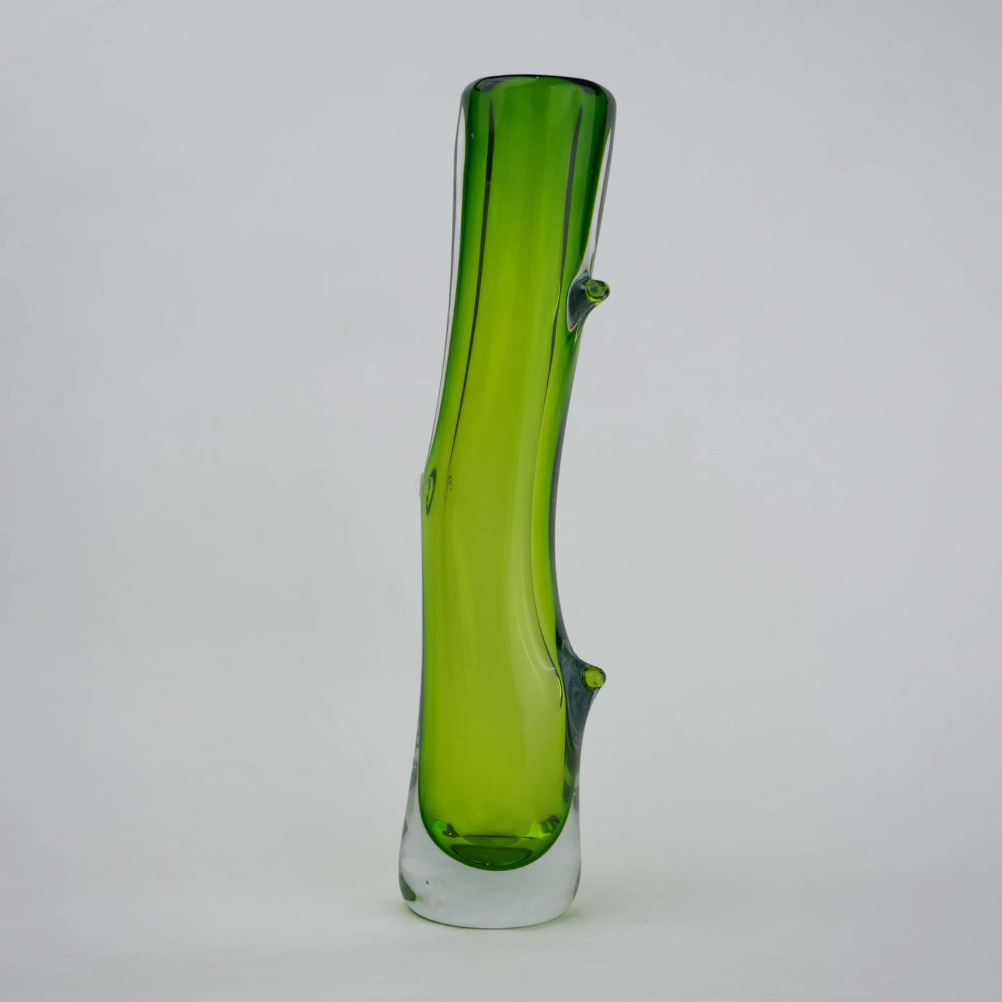 Clear glass stem vase with a branch-like shape and an inner core detail.