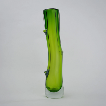 Clear glass stem vase with a branch-like shape and an inner core detail.