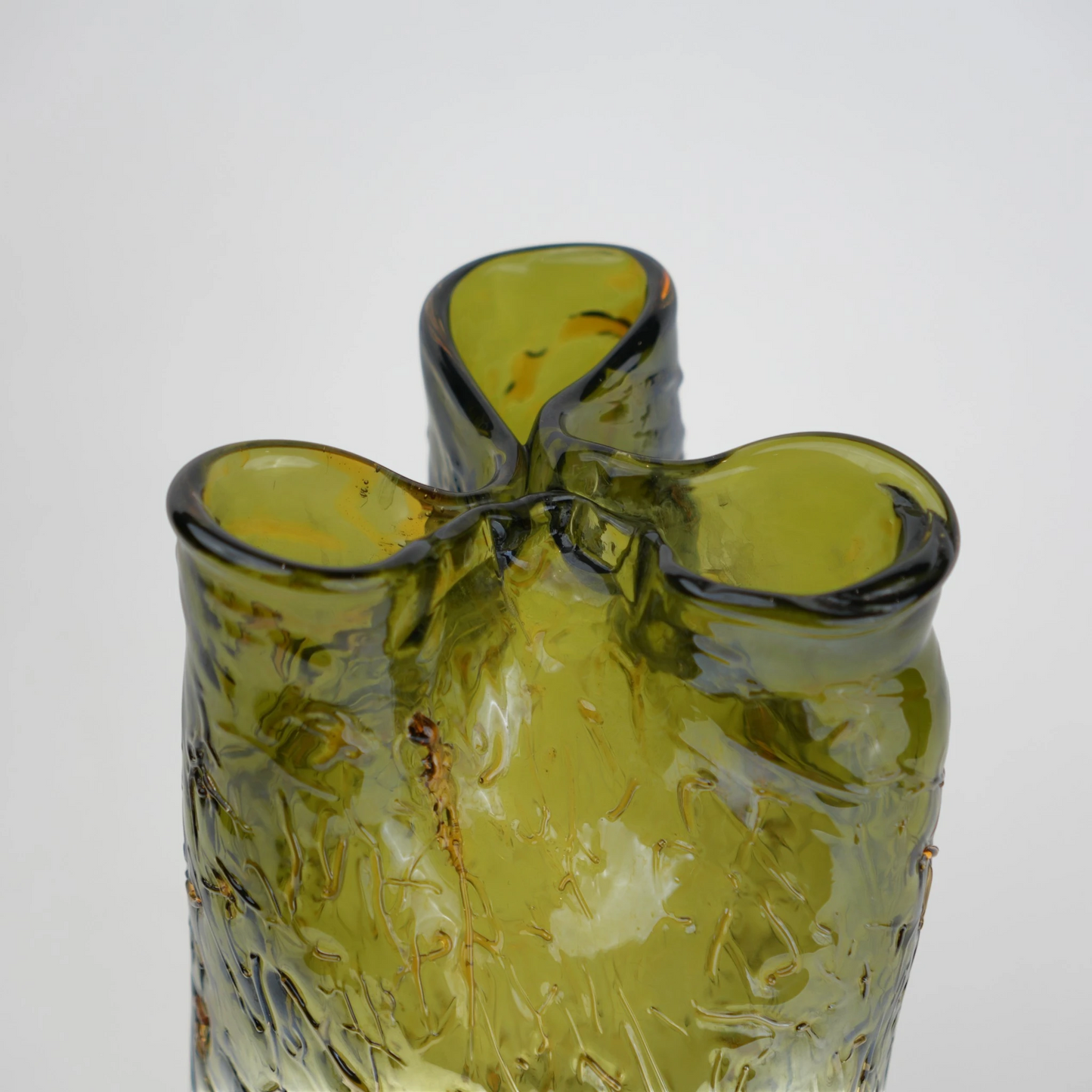 Olive green crackle-textured cylindrical glass vase with organic surface pattern.