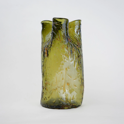 Olive green crackle-textured cylindrical glass vase with organic surface pattern.