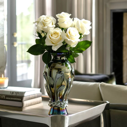 Chrome smoke reflective glass vase with curved body and metallic finish.
