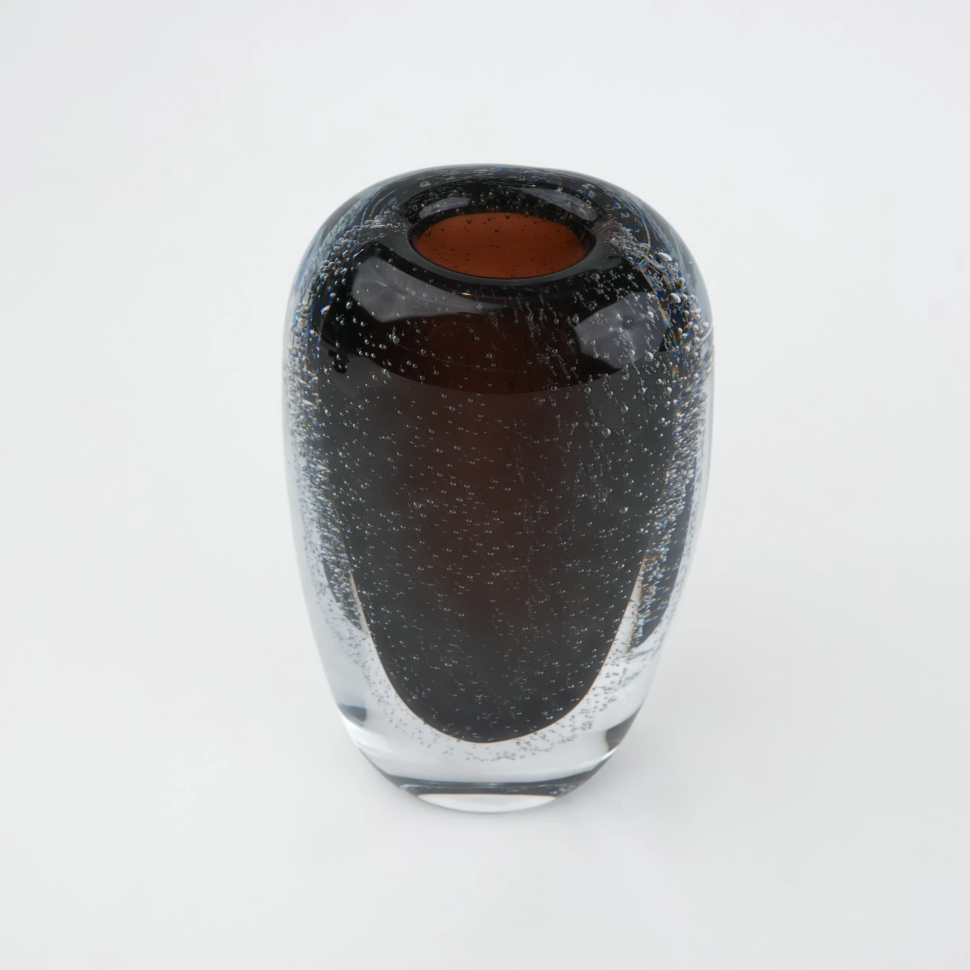 Smoked brown double-layer glass vase with clear outer shell and elongated oval shape.