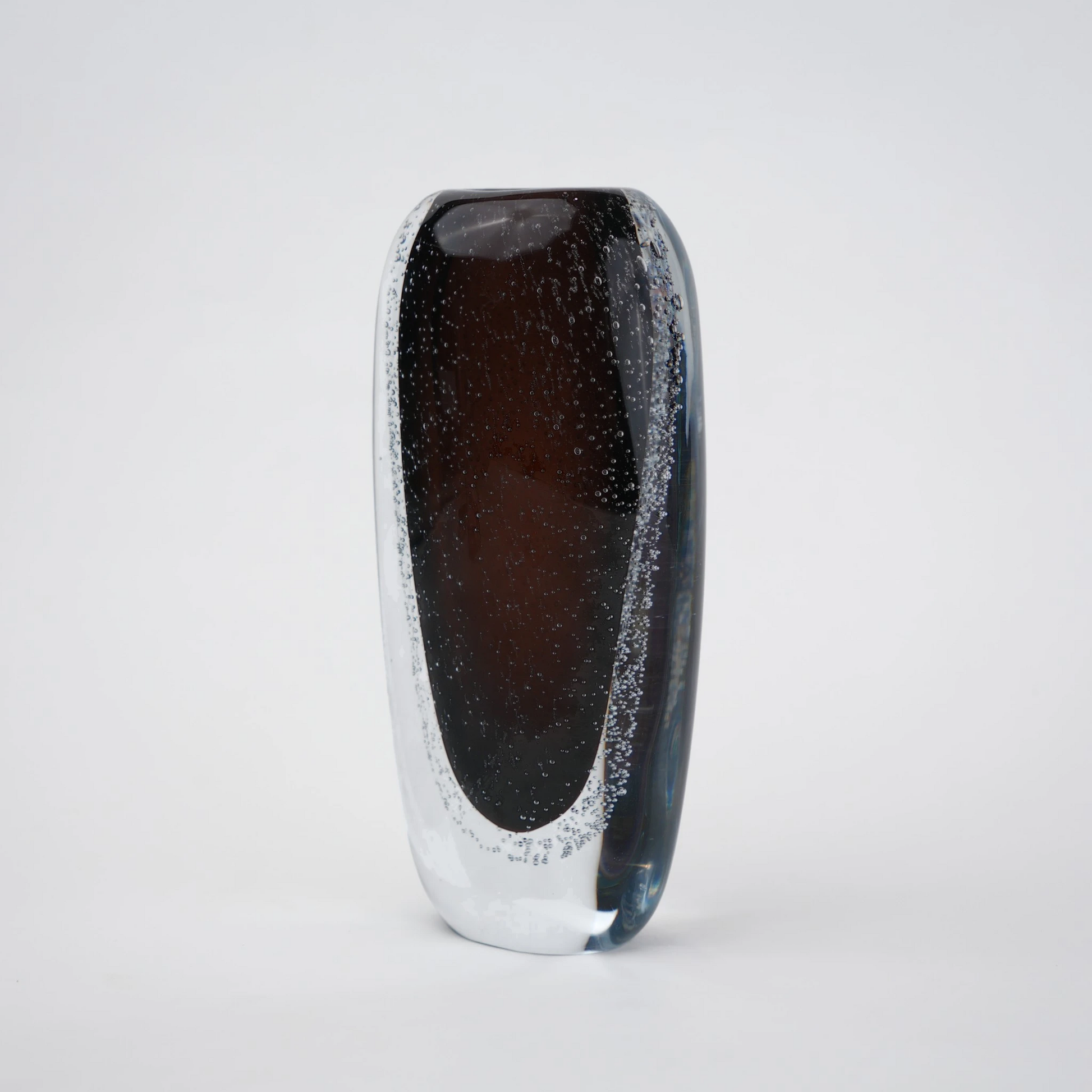 Smoked brown double-layer glass vase with clear outer shell and elongated oval shape.