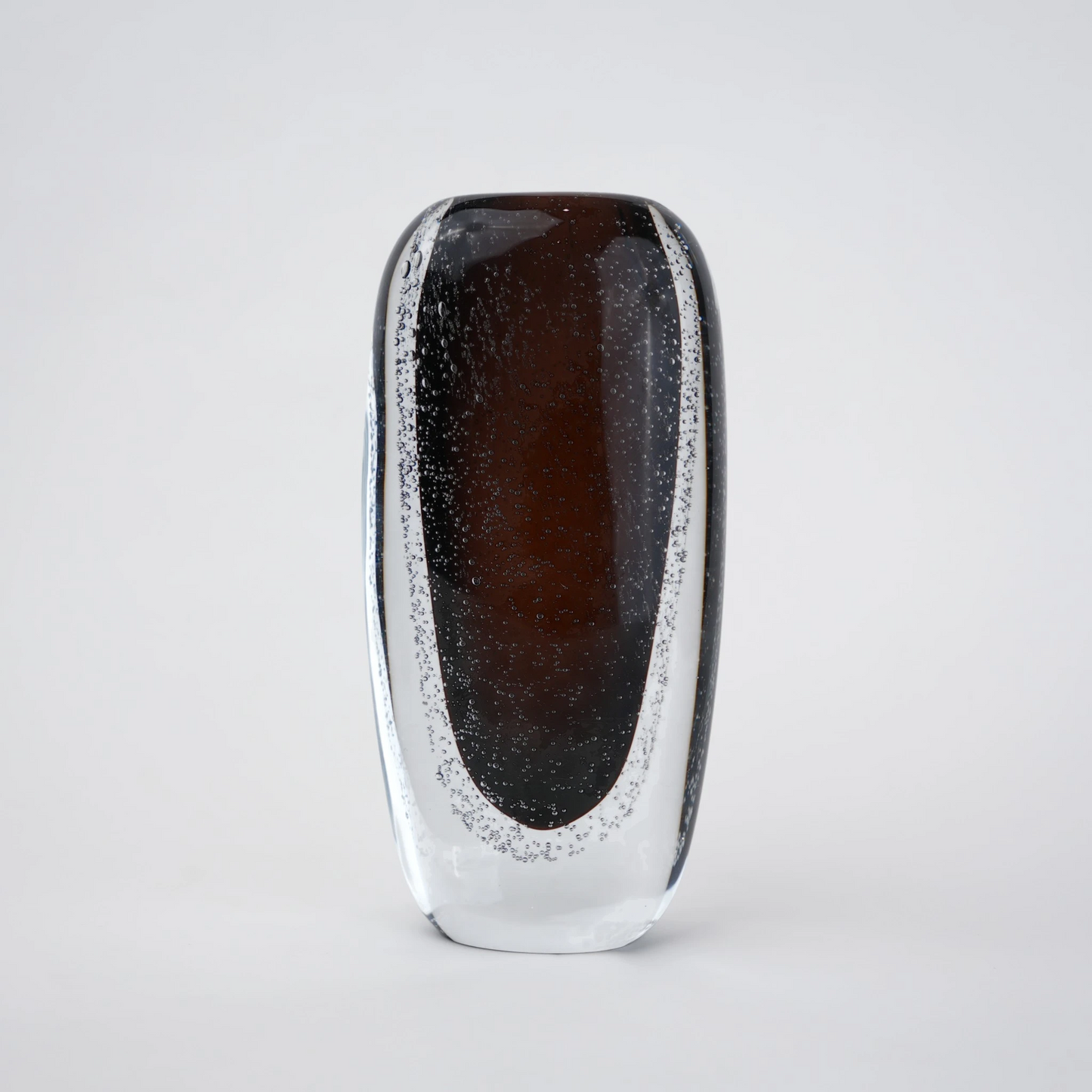 Smoked brown double-layer glass vase with clear outer shell and elongated oval shape.