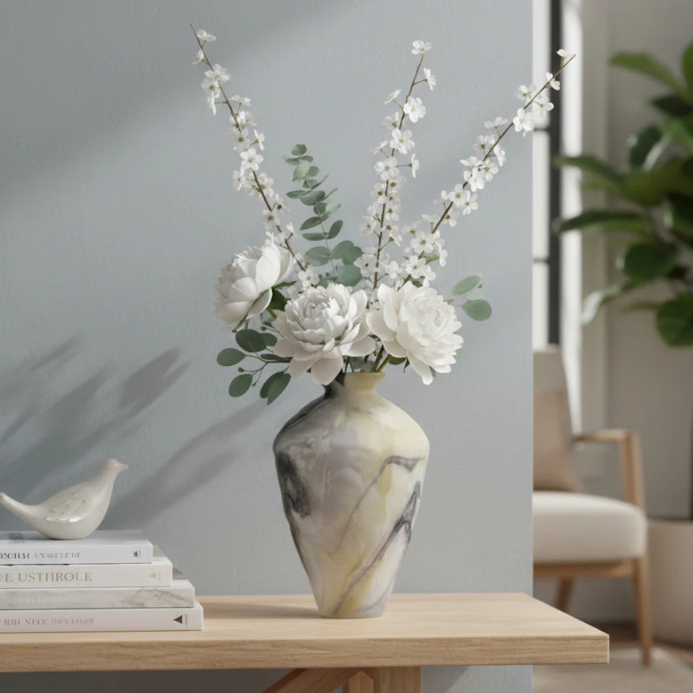 Tall white marble glass vase with flowing pattern and tapered silhouette.