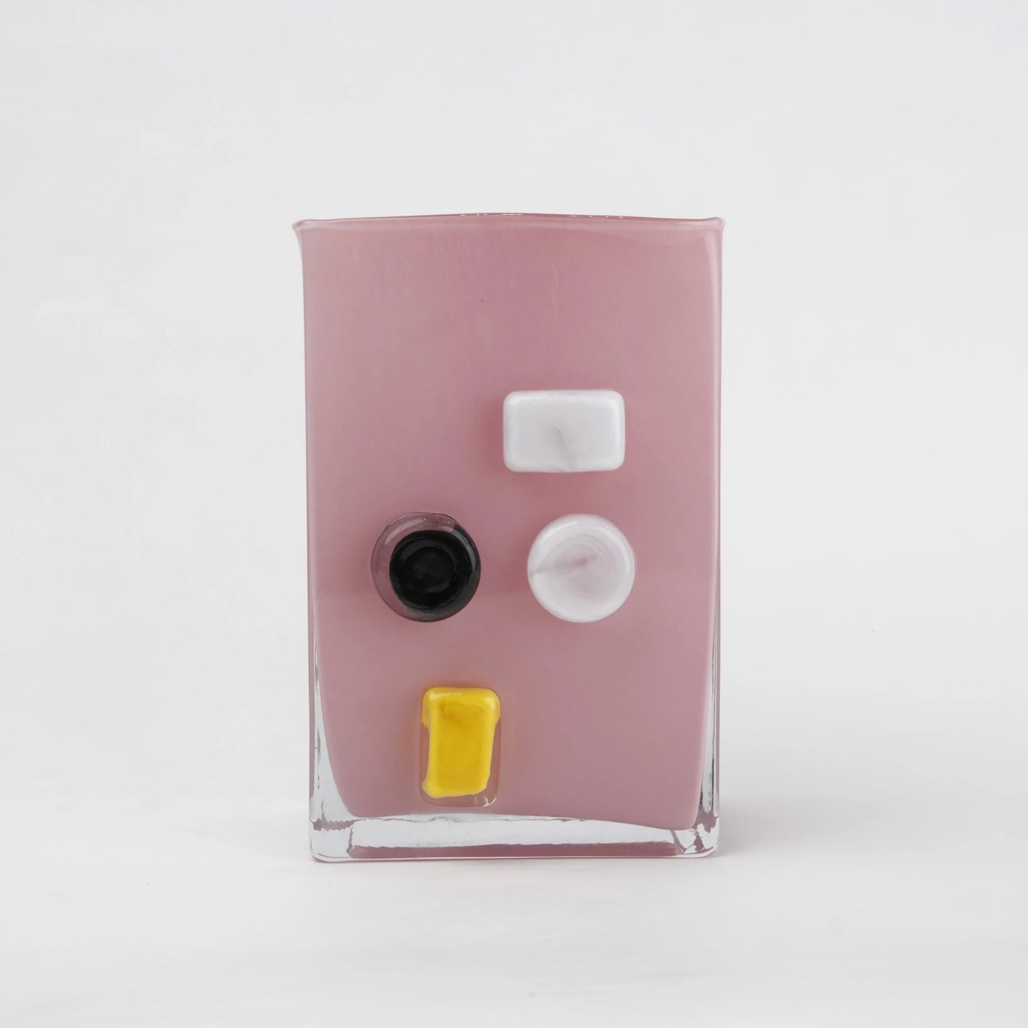 Pink art glass vase with embedded multicolor accents and wide rectangular form.