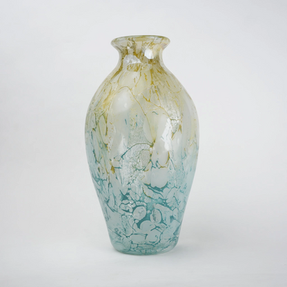Rounded decorative vase with a narrow neck and marbled finish.
