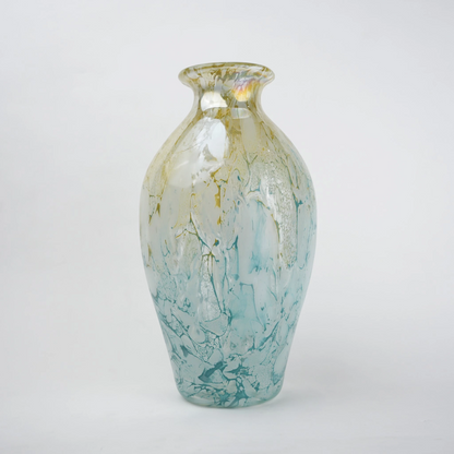Rounded decorative vase with a narrow neck and marbled finish.