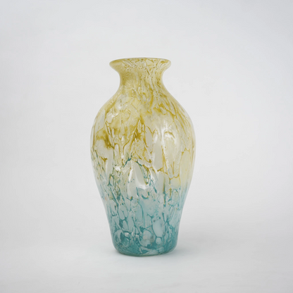 Rounded decorative vase with a narrow neck and marbled finish.