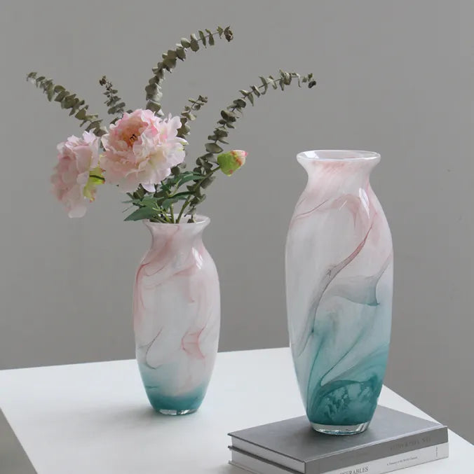 Textured marble-effect glass vase with soft gradient finish and rounded silhouette.
