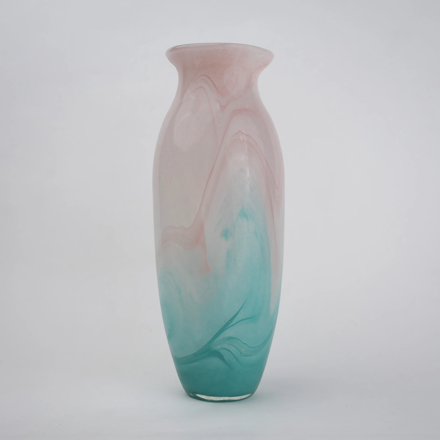 Textured marble-effect glass vase with soft gradient finish and rounded silhouette.