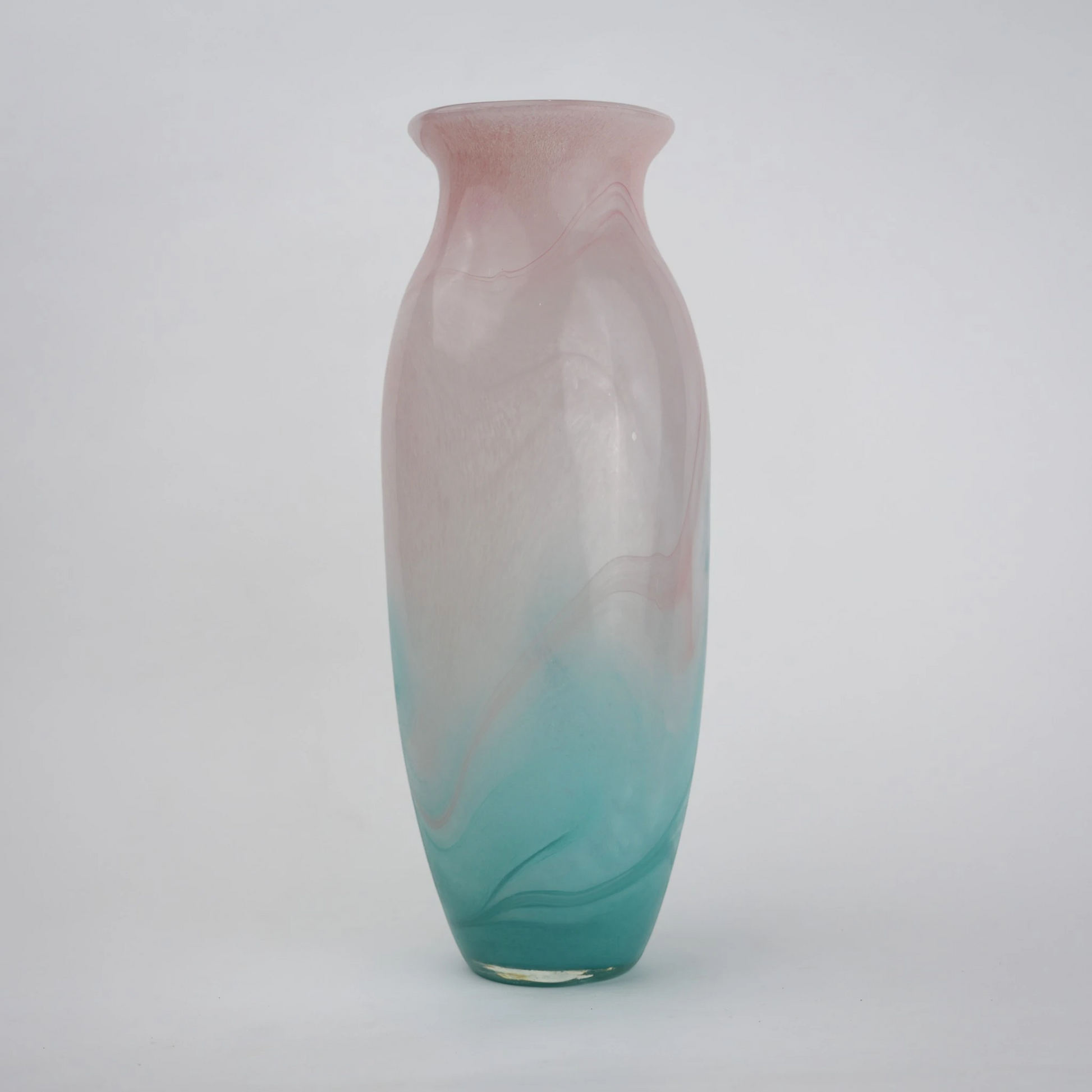 Textured marble-effect glass vase with soft gradient finish and rounded silhouette.