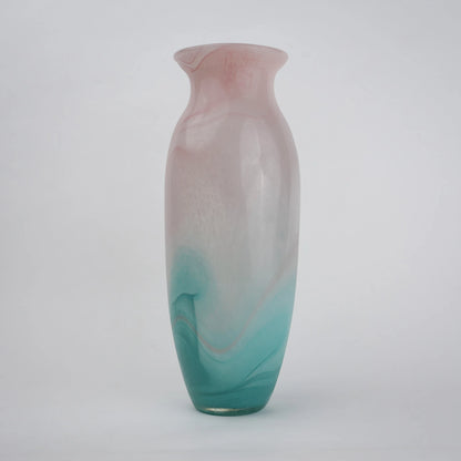 Textured marble-effect glass vase with soft gradient finish and rounded silhouette.