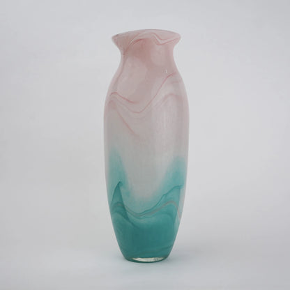 Textured marble-effect glass vase with soft gradient finish and rounded silhouette.