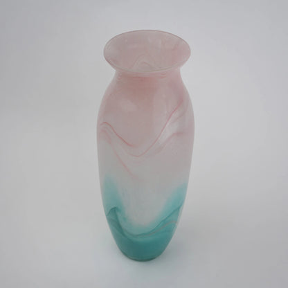 Textured marble-effect glass vase with soft gradient finish and rounded silhouette.