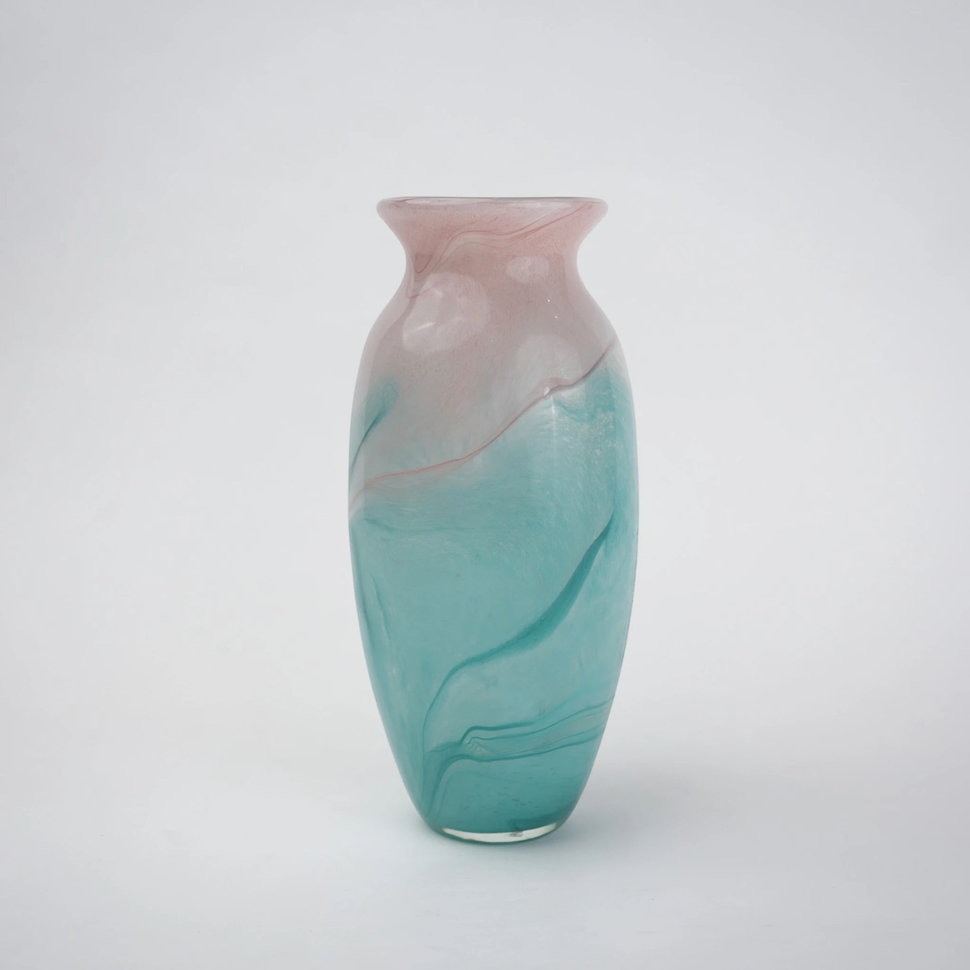 Textured marble-effect glass vase with soft gradient finish and rounded silhouette.