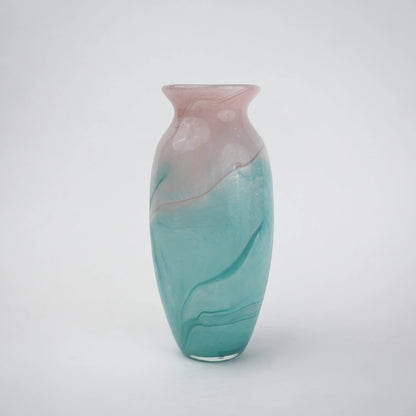 Textured marble-effect glass vase with soft gradient finish and rounded silhouette.