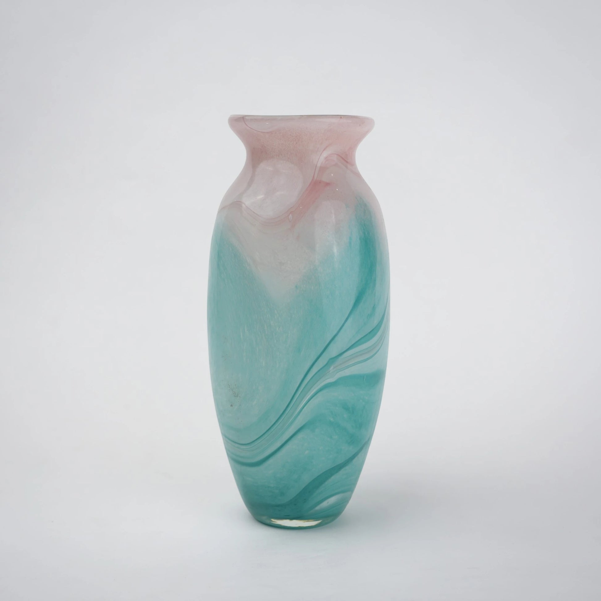 Textured marble-effect glass vase with soft gradient finish and rounded silhouette.
