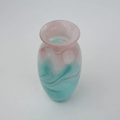 Textured marble-effect glass vase with soft gradient finish and rounded silhouette.