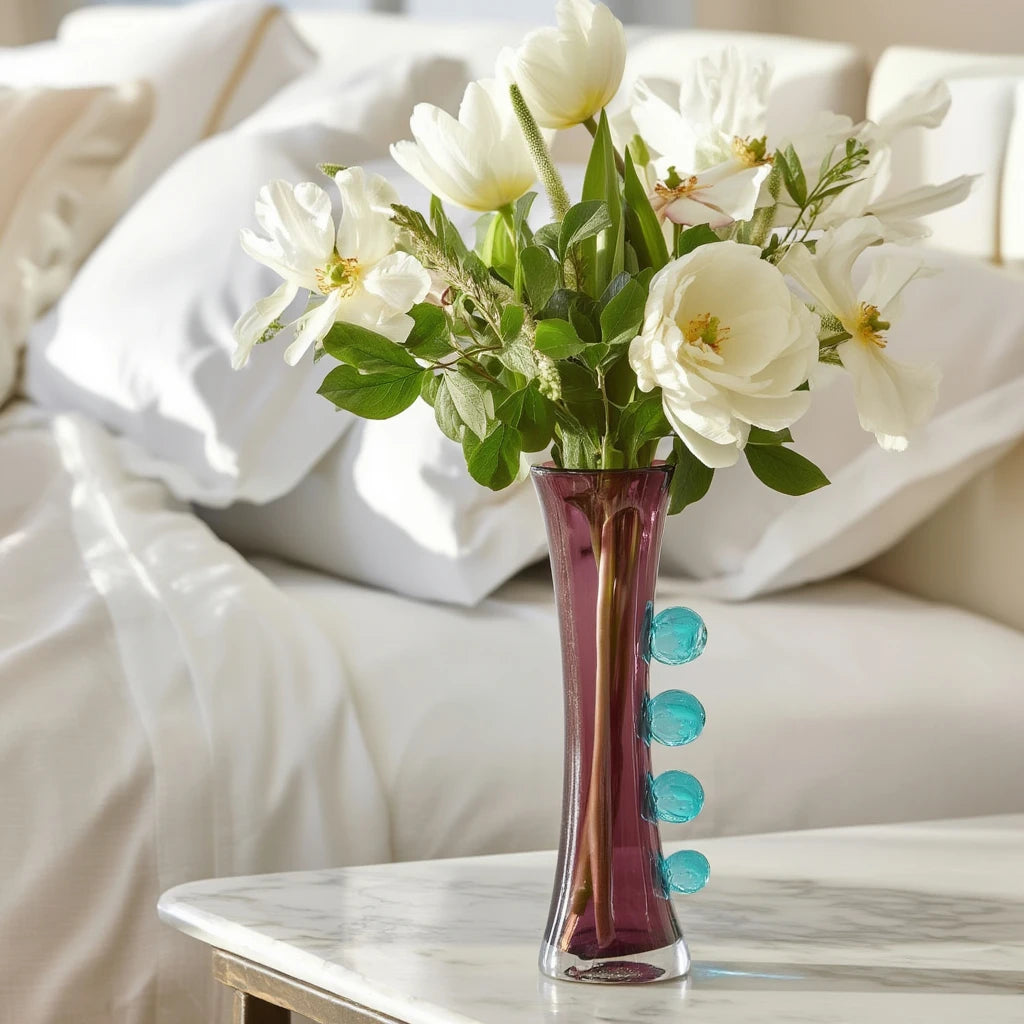 Purple art glass vase with elongated silhouette and raised translucent side accents.