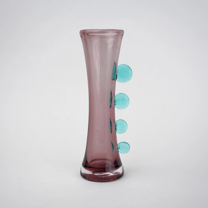 Purple art glass vase with elongated silhouette and raised translucent side accents.
