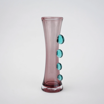 Purple art glass vase with elongated silhouette and raised translucent side accents.