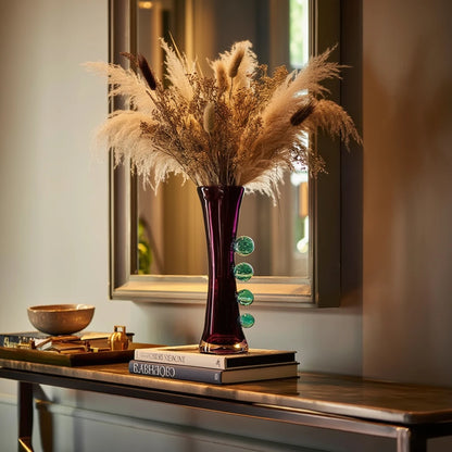 Purple art glass vase with elongated silhouette and raised translucent side accents.