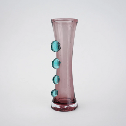 Purple art glass vase with elongated silhouette and raised translucent side accents.