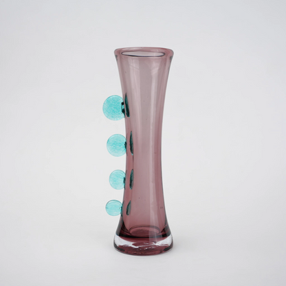 Purple art glass vase with elongated silhouette and raised translucent side accents.