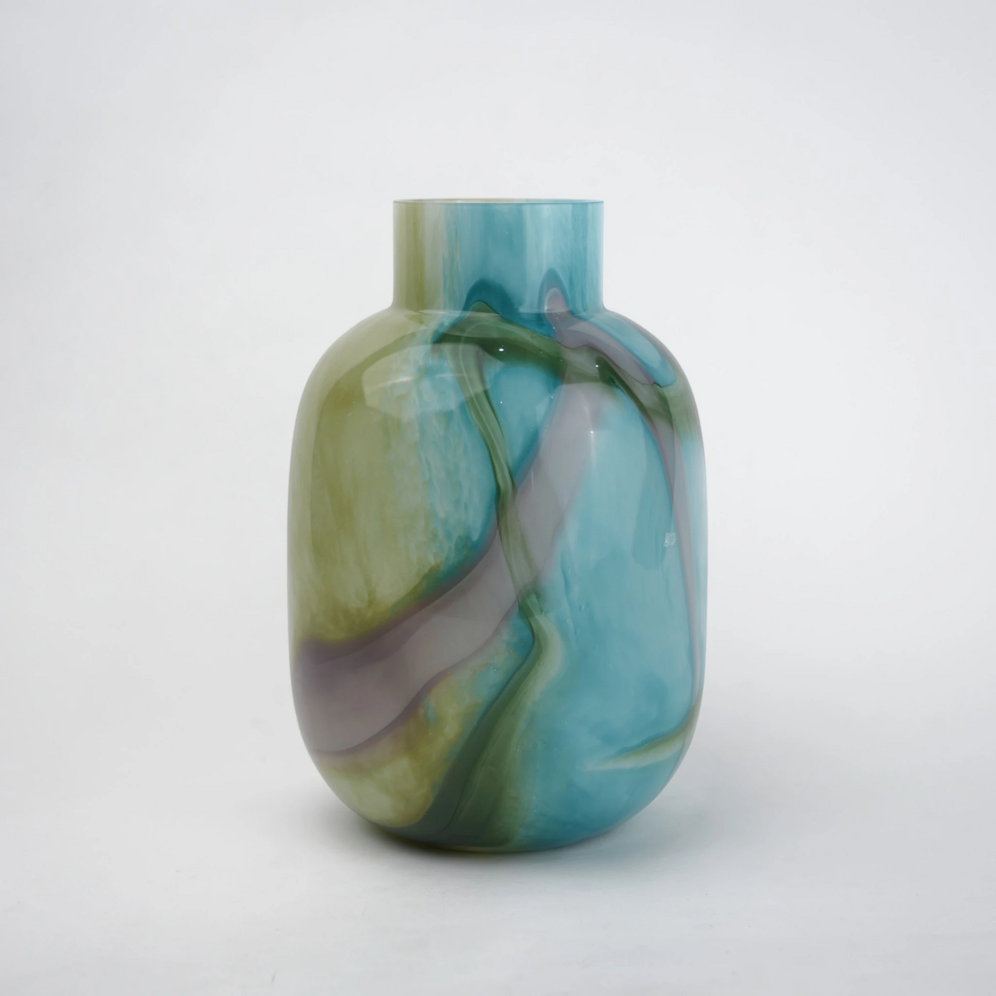 Blue marble effect glass vase with a smooth glossy finish, featuring a rounded body and short cylindrical neck, designed as a modern decorative piece for home decor styling.