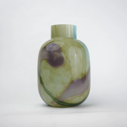 Blue marble effect glass vase with a smooth glossy finish, featuring a rounded body and short cylindrical neck, designed as a modern decorative piece for home decor styling.
